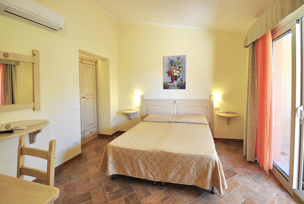 Affittacamere B&B La Villa Dei Graniti Villasimius Habitación foto
